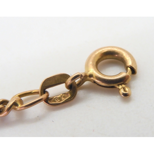 594 - A 9ct gold riding crop brooch made by Joseph Cook & Son, length 5.8cm, together  with a 9ct... 