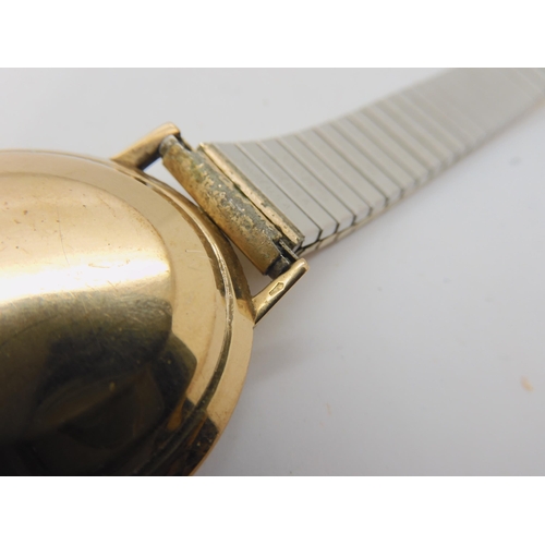 665 - A Swiss gold Rotary Commodore watch (af) weight including mechanism and strap 53.9gms, four silver b... 