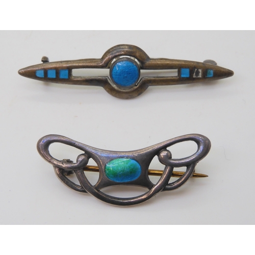 671 - Two Charles Horner enamelled Art Nouveau brooches, both Chester dated 1910 -1912, a Norwegian silver... 