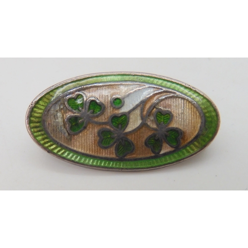 672 - A collection of Charles Horner brooches to include a turquoise glazed ceramic plaque brooch, Chester... 