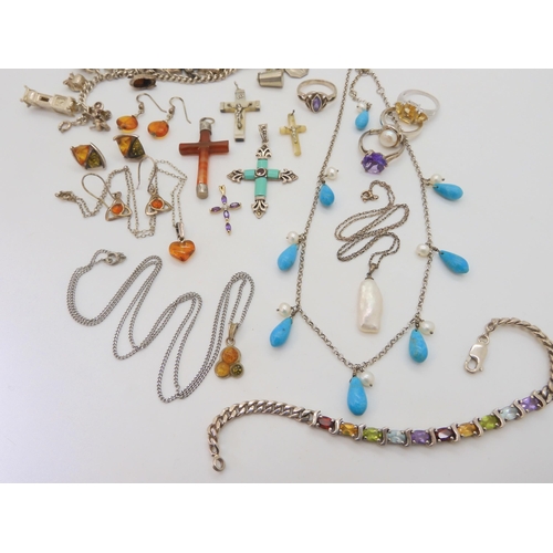 676 - A collection of silver and gemstone crosses, a silver charm bracelet with fifteen silver and white m... 