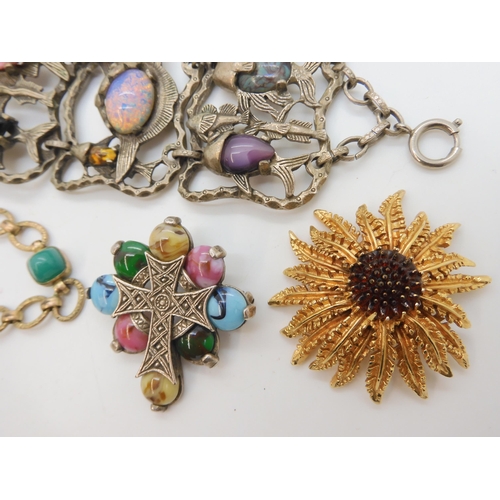 693 - An early Butler & Wilson fish bracelet, a Sarah Coventry brooch, a Miracle pendant and other ite... 