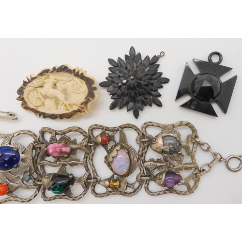 693 - An early Butler & Wilson fish bracelet, a Sarah Coventry brooch, a Miracle pendant and other ite... 