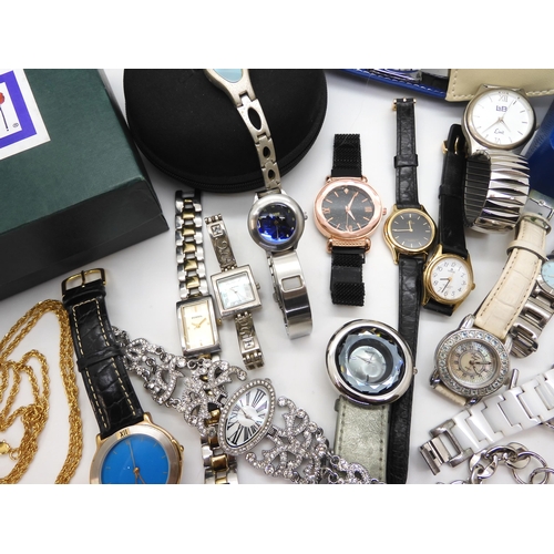 695 - A collection of fashion watches to include Storm, a Mackintosh style watch, traveling clock in the s... 