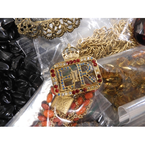 700 - A large collection of vintage costume jewellery to include, pearls, vintage beads, brooches a souven... 