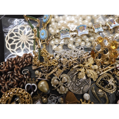 700 - A large collection of vintage costume jewellery to include, pearls, vintage beads, brooches a souven... 