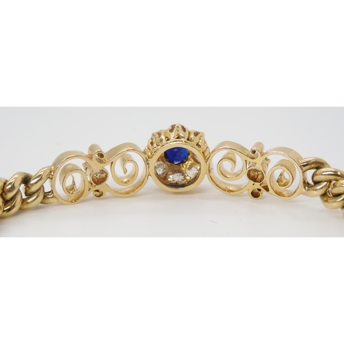 2796 - A SAPPHIRE AND DIAMOND FLOWER BRACELETset throughout in bright yellow metal, with diamond and sapphi... 