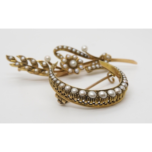 2799 - TWO VINTAGE PEARL BROOCHESto include a crescent moon brooch, stamped 15ct and set with split pearls ... 