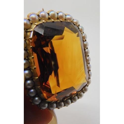 2804 - A 15CT GOLD CITRINE AND PEARL BROOCHset with a 25mm x 18mm x 12mm cognac colour citrine in cut back ... 