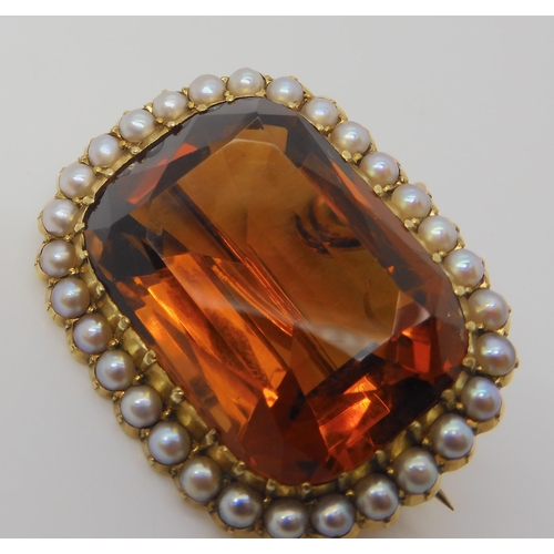 2804 - A 15CT GOLD CITRINE AND PEARL BROOCHset with a 25mm x 18mm x 12mm cognac colour citrine in cut back ... 