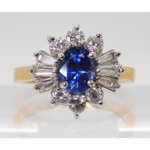 2724 - A SAPPHIRE & DIAMOND CLUSTER RINGset in 18ct yellow and white gold, the starburst configuration ... 