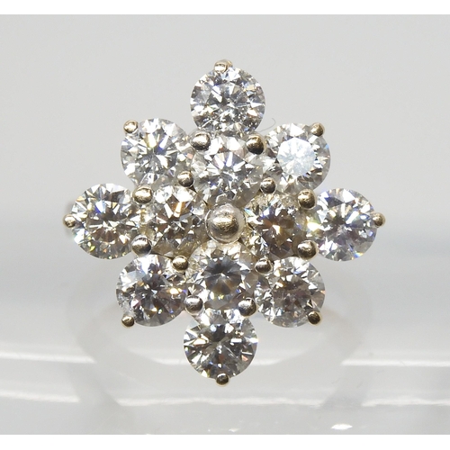 2788 - A SUBSTANTIAL DIAMOND CLUSTER RINGset with estimated approx 3.60cts of brilliant cut diamonds, mount... 