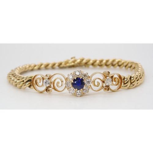 2796 - A SAPPHIRE AND DIAMOND FLOWER BRACELETset throughout in bright yellow metal, with diamond and sapphi... 