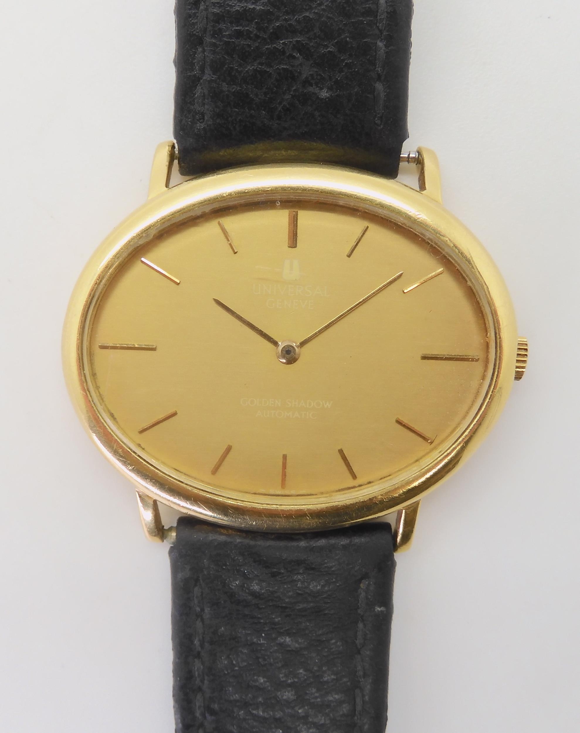 A UNIVERSAL GENEVE GOLDEN SHADOW with an automatic movement the