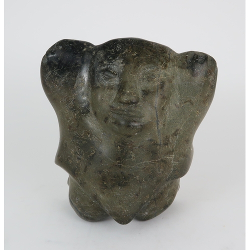 2952 - A 20TH CENTURY INUIT SOAPSTONE CARVING OF A FIGURE WITH HANDS ALOFT20.5cm high (8