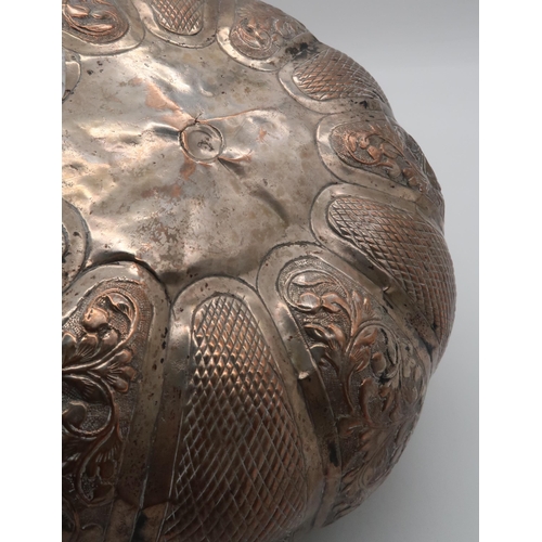 416 - A white metal vessel in the form of a gourd, with alternating panels of scrolling foliate and lattic... 