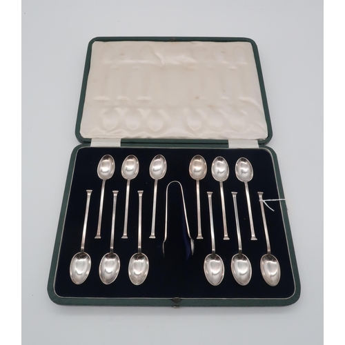 414 - A cased set of silver seal top tea spoons and sugar tongs, by Cooper Brothers & Sons, Sheffield ... 