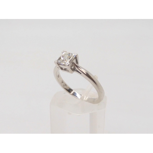 657 - An 18ct white gold princess cut diamond ring the diamond is estimated approx at 0.70ctsin classic fo... 