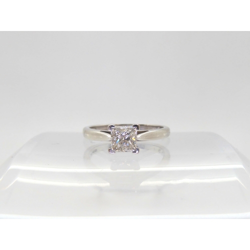 657 - An 18ct white gold princess cut diamond ring the diamond is estimated approx at 0.70ctsin classic fo... 