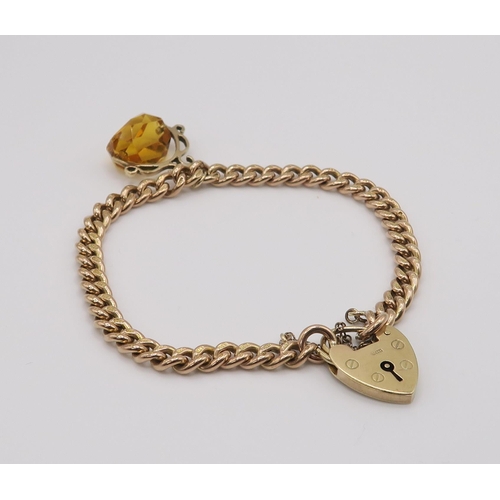 609 - A 9ct rose gold curb chain bracelet with a glass set fob seal and heart shaped clasp, hallmarked .37... 