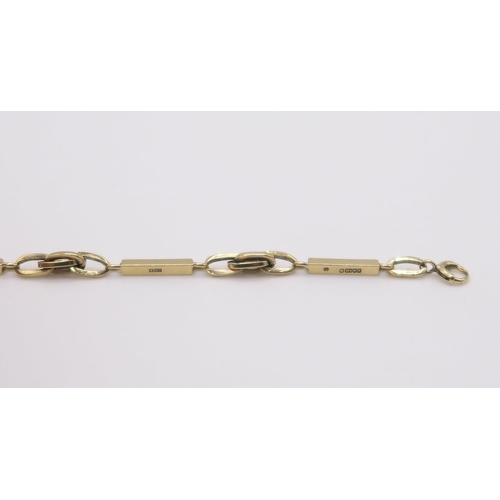 610 - A 9ct gold fancy baton link necklace, hallmarked London 1979, length 43cm, weight 15.5gms