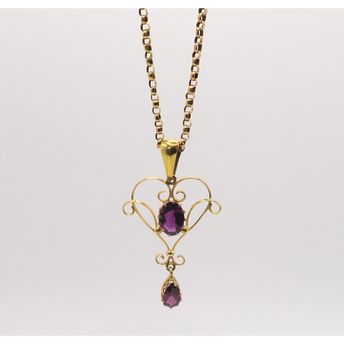 613 - A 9ct garnet set Edwardian pendant, together with a 9ct gold vintage chain. Length of pendant 4cm, l... 