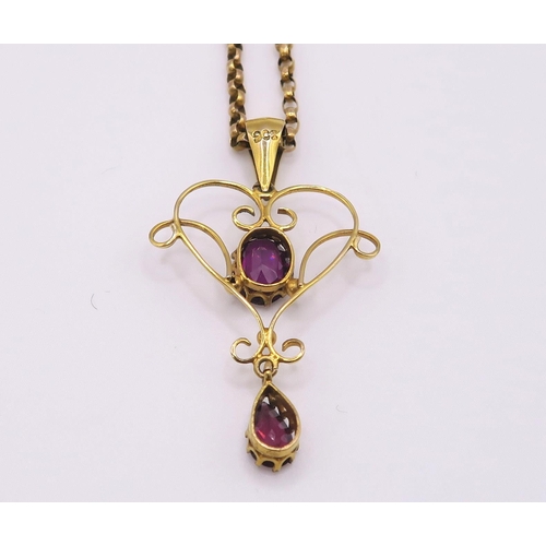 613 - A 9ct garnet set Edwardian pendant, together with a 9ct gold vintage chain. Length of pendant 4cm, l... 