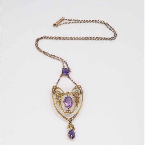 617 - A 9ct gold, amethyst and pearl Edwardian pendant necklace, length of the winged pendant from th... 