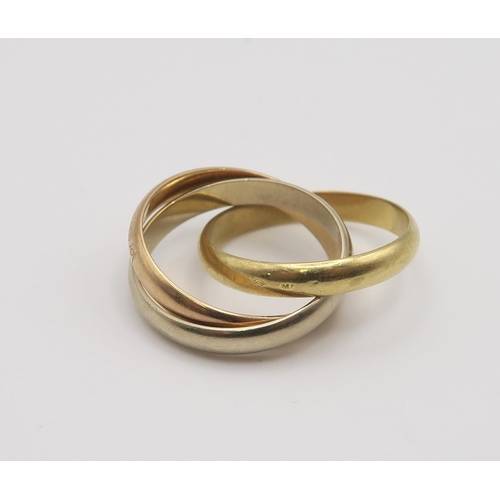 620 - A Cartier 18ct three colour gold 'Trinity Ring' the red gold band stamped 'Les Must De Cartier' inne... 