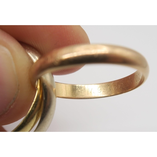 620 - A Cartier 18ct three colour gold 'Trinity Ring' the red gold band stamped 'Les Must De Cartier' inne... 