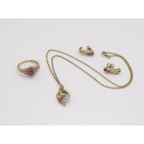 621 - A 9ct gold ruby and diamond pendant on chain and matching earrings together with a similar ring set ... 