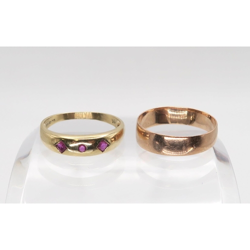 626 - A 9ct rose gold wedding ring hallmarked Birmingham 1915, together with a 9ct gold ruby ring size O1/... 