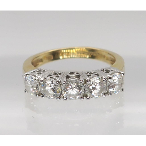 632 - A 14k gold cz five stone ring, size O1/2, weight 4.8gms