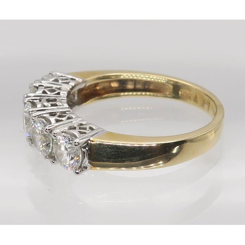 632 - A 14k gold cz five stone ring, size O1/2, weight 4.8gms