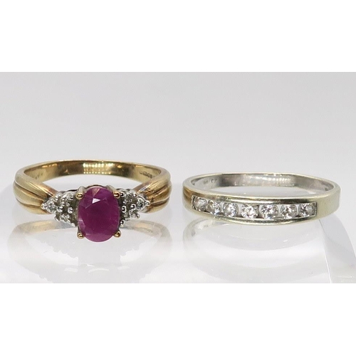 645 - A 9ct gold ruby and diamond accent ring, size P, together with a 9ct white gold cz ring size P1/2, w... 