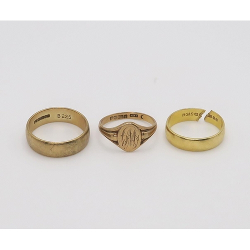 650 - An 18ct gold wedding ring, (snipped shank)approx size M1/2, weight 4.1gms, together with a 9ct weddi... 