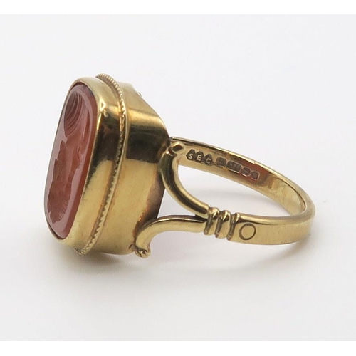 655 - A 9ct gold intaglio ring set with a carnelian carved with a maiden, finger size P, weight 4.2gms