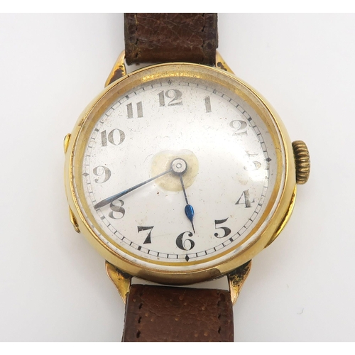 659 - An 18ct gold gents Swiss watch, diameter 3.3cm, weight with strap and mechanism 36gms