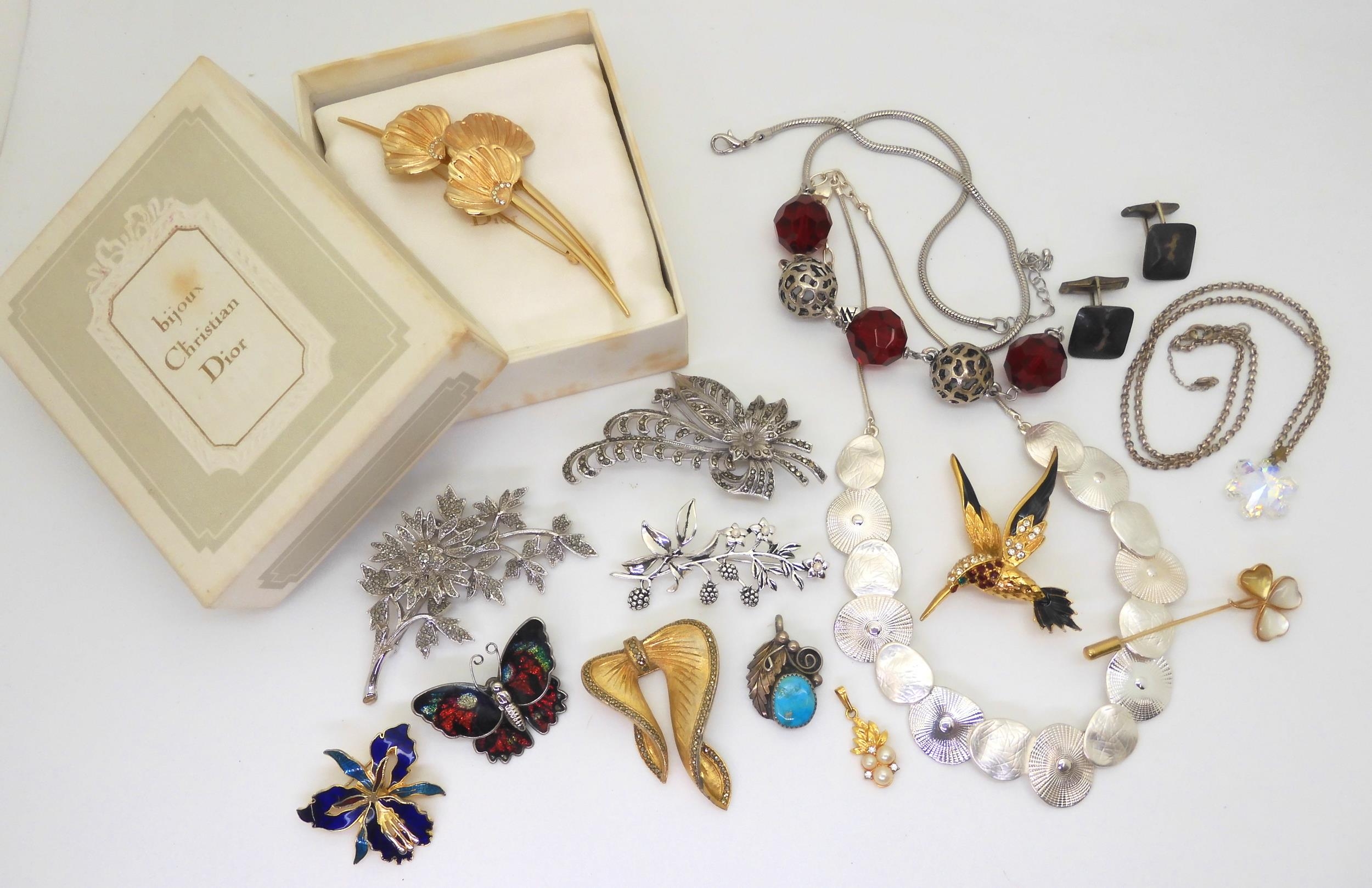 A vintage Christian Dior brooch in original box, a
