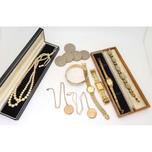 792 - Two 9ct gold vintage lockets, a gold plated silver bangle, a collection of costume jewellery watches... 