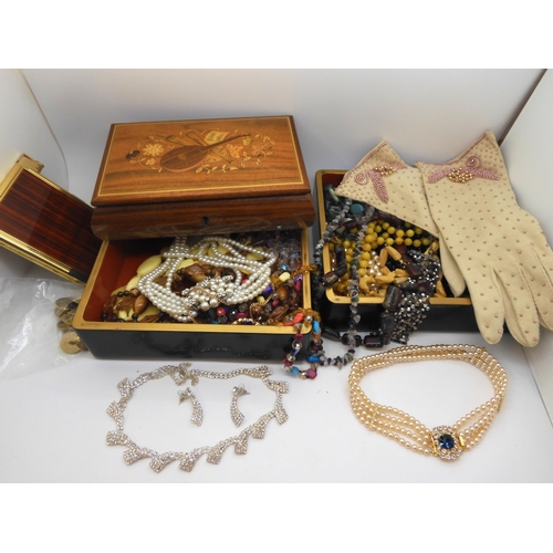 800 - A pair of vintage evening gloves, a marquetry jewel box filled with beads,  costume jewellery etc