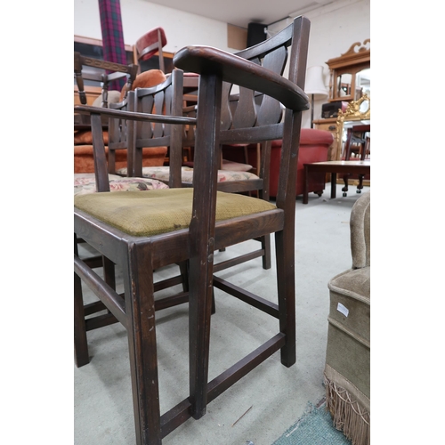 104 - A lot of five mid 20th century early Ercol elm dining chairs with pierced splats over upholstered se... 