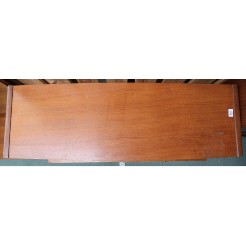 113 - A mid 20th century teak two tier coffee table on square tapering supports, 36cm high x 114cm long x ... 