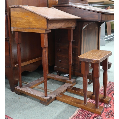 126 - A 20th century elm children's school desk with integrated stool, 71cm high x 47cm wide x 70cm deep