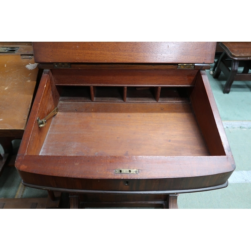 127 - A Victorian walnut Davenport desk with hinged top stationary compartment over embossed skiver over f... 