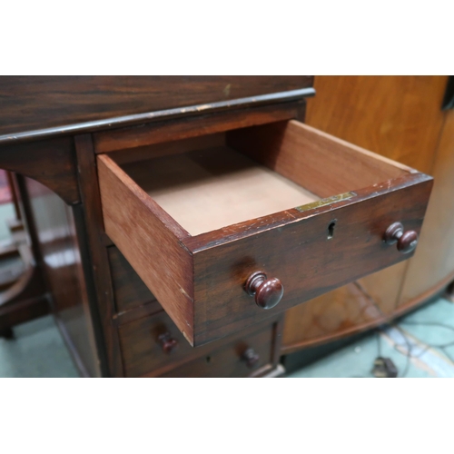 127 - A Victorian walnut Davenport desk with hinged top stationary compartment over embossed skiver over f... 