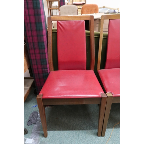 132 - A lot comprising a set of four mid 20th century teak and red vinyl upholstered dining chairs and a p... 