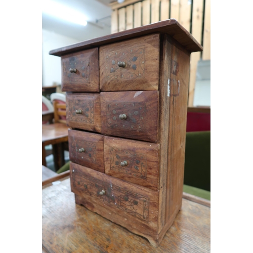 134 - A mixed lot to include oak two tier tea trolley, hardwood apprentice style seven drawer chest and an... 