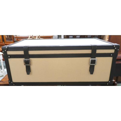 150 - A contemporary leather bound trunk with canvas lined exterior, 42cm high x 112cm wide x 61cm deep