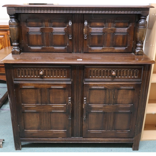 152 - A mid 20th century Priory sideboard with pair of cabinet doors over pair of drawers over pair of pan... 